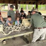 Mississippi wildlife officials engage with visitors at Mason Creek WMA Photos from Mississippi Department of Wildlife, Fisheries, and Parks's post
